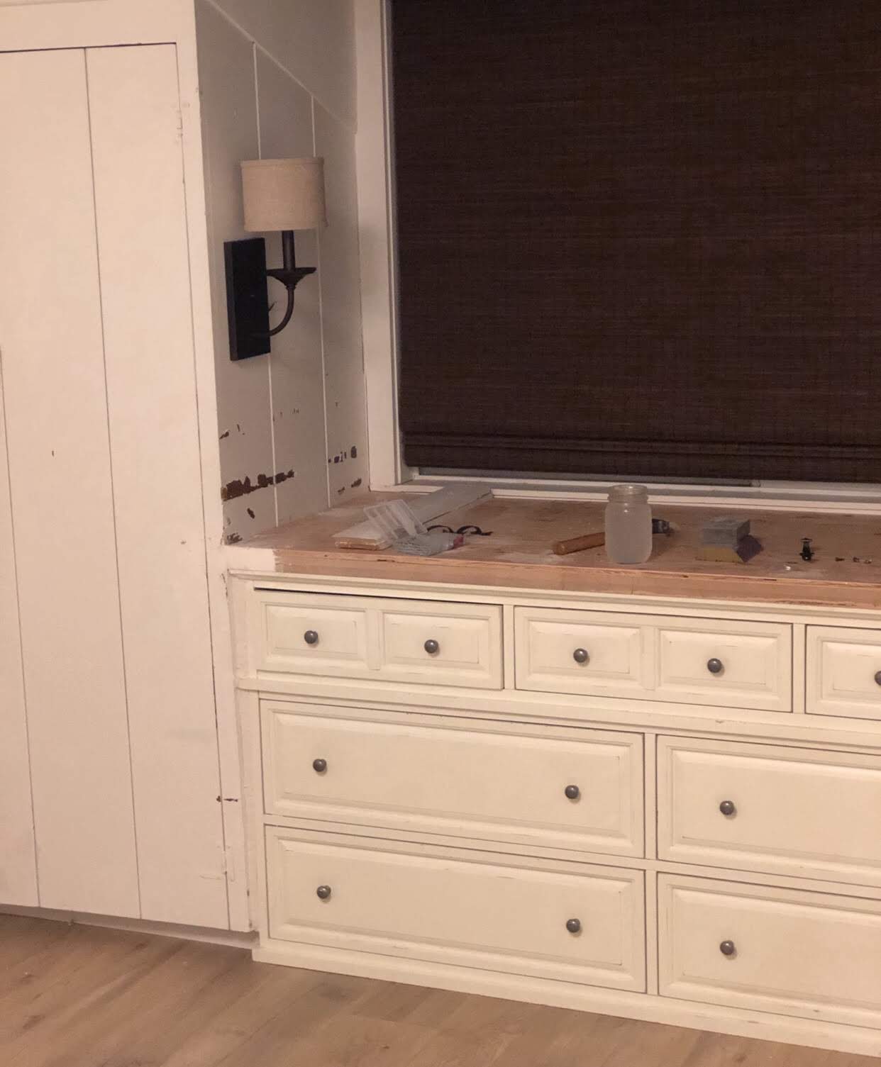 How I repurposed an old dresser and turned it into a beautiful built-in for my daughter's bedroom and completely transformed the space. Built in closets, interior dormer window, swiss coffee white paint, laminate wood floors, 1950 beach cottage