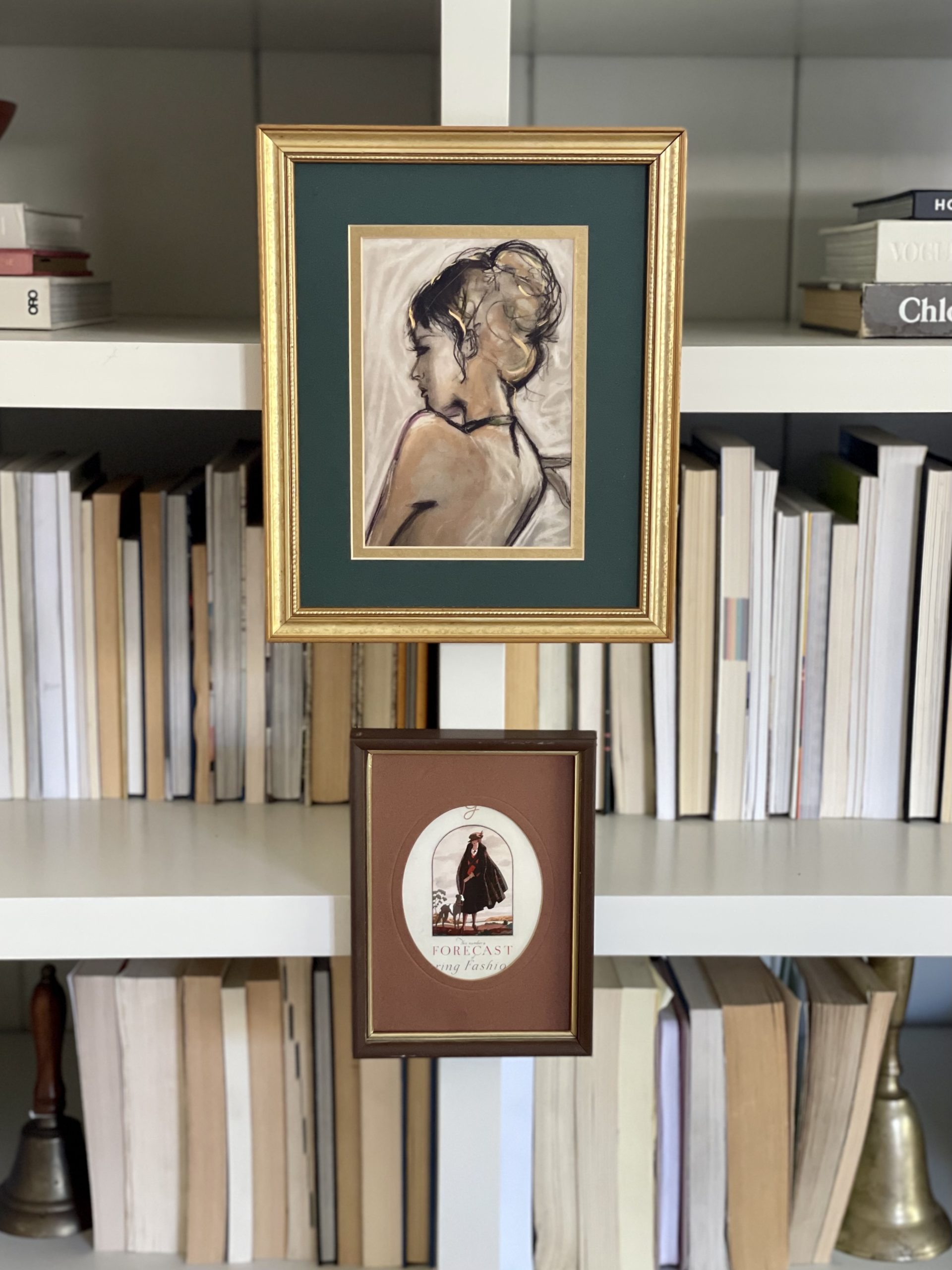 Art in unexpected places, two mixed frames, thrifted art, art on bookshelf, books displayed backwards, modern traditional home, pretty on fridays