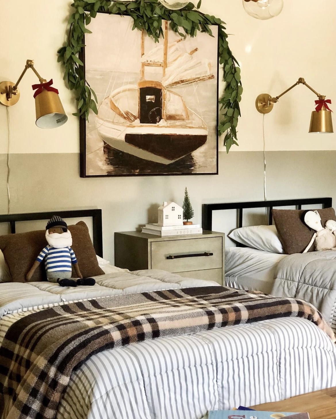 shared kids' bedroom, shared sibling bedroom, shared kid's room, two twin kids, swing arm sconce, swing arm sconce over bed, sconce over bed, nautical art, nautical kids room, kids room ideas, kids bedroom inspiration, kids bedroom design, art between two kids, rooms with two kids, striped bedding, bed styling in kids rooms, bench end of bed, half painted room, greige paint, swiss coffee dun edards paint