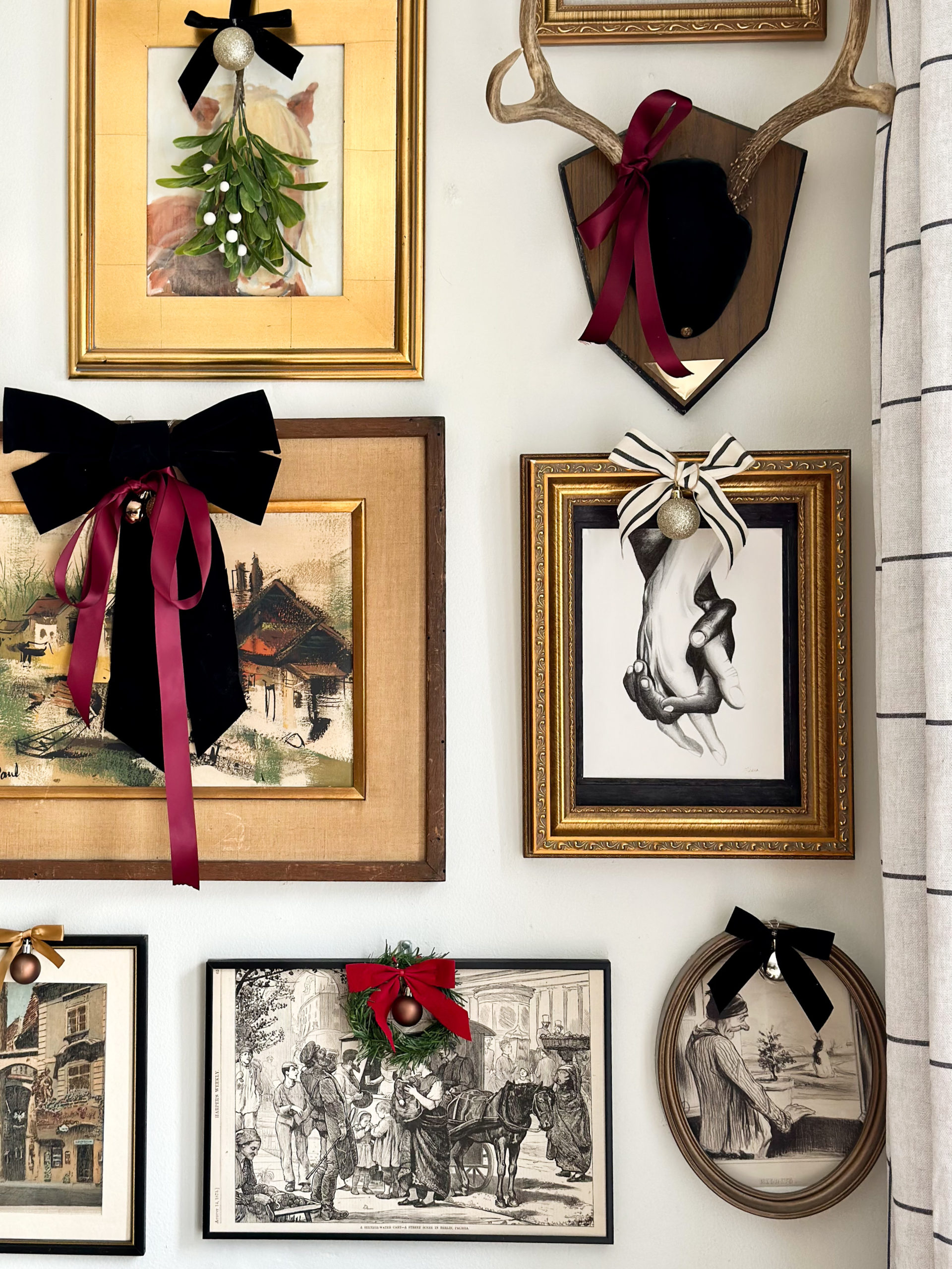 easy and budget friendly ways to decorate for christmas, decorating with bows, decorating art for christmas, christmas decor ideas, bows on frames, decorating art for christmas, christmas diy, framing wrapping paper, decorating gallery wall for christmas, bows on art, wreath on art